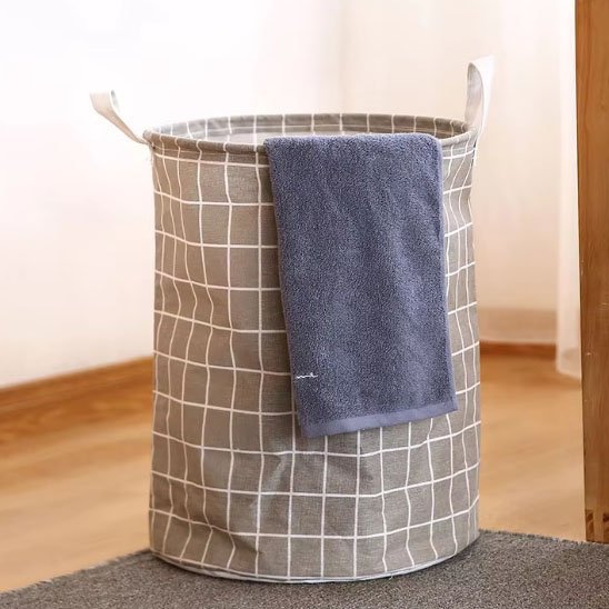 panier a linge linbox gris avec linge