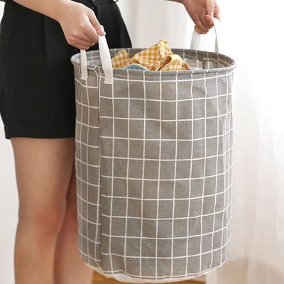panier a linge linbox gris avec linges